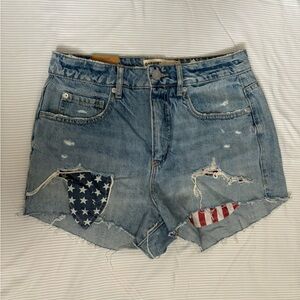Garage distressed Jean shorts. American flag pockets. Size 5. Never worn.